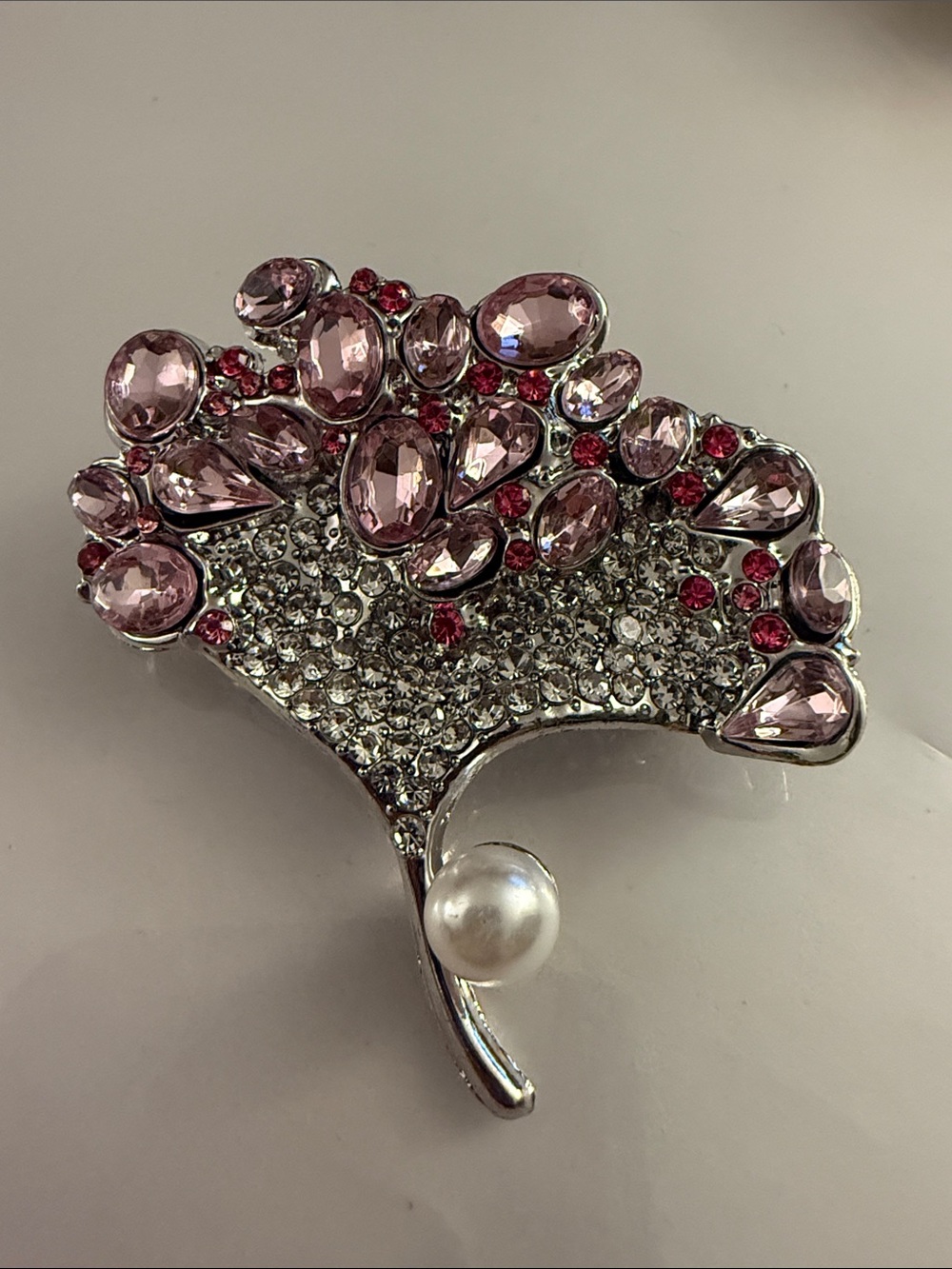 Elegant Pink Crystal Fan Brooch with Pearl Accent